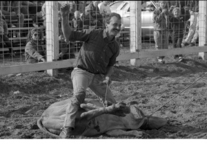 Steve Watters in calf roping event for faculty and local business people 1989